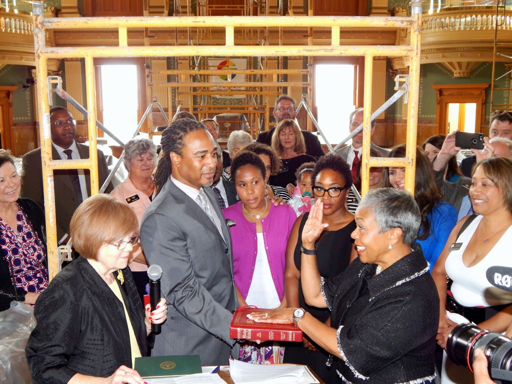 2015 swearing in ceremony at the Colorado State Capitol (under renovation) of State Representative Janet P. Buckner to fill her late husband's House of Representatives legislative seat. 