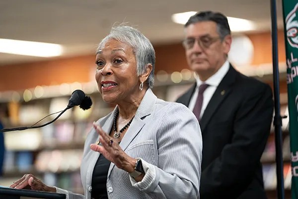State Sen. Janet Buckner addresses students and community members during the signing of public safety legislation. [Photo by Philip B. Poston, Sentinel, Colorado]